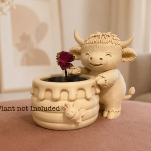 Cow with a honey pot planter